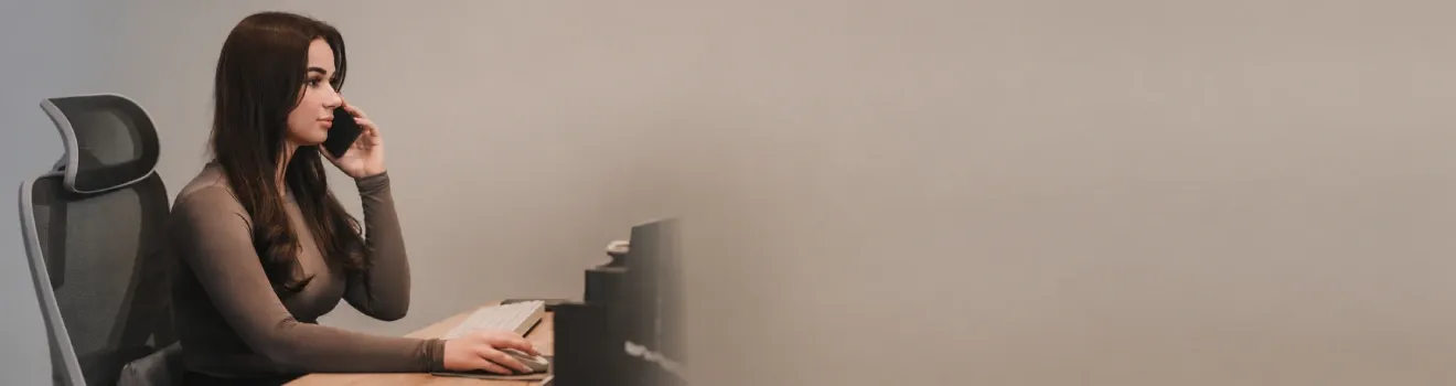 ProDent receptionist taking a phone call at her desk